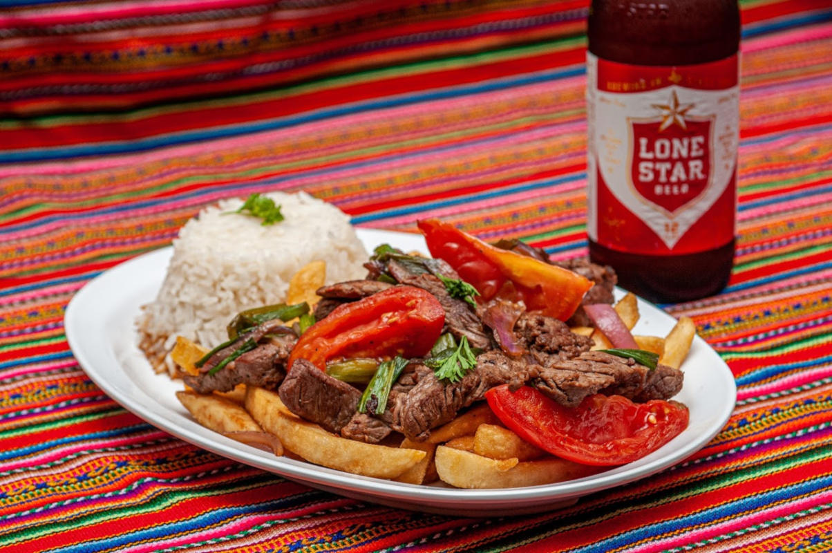 Grilled meat, rice, fries and vegetables